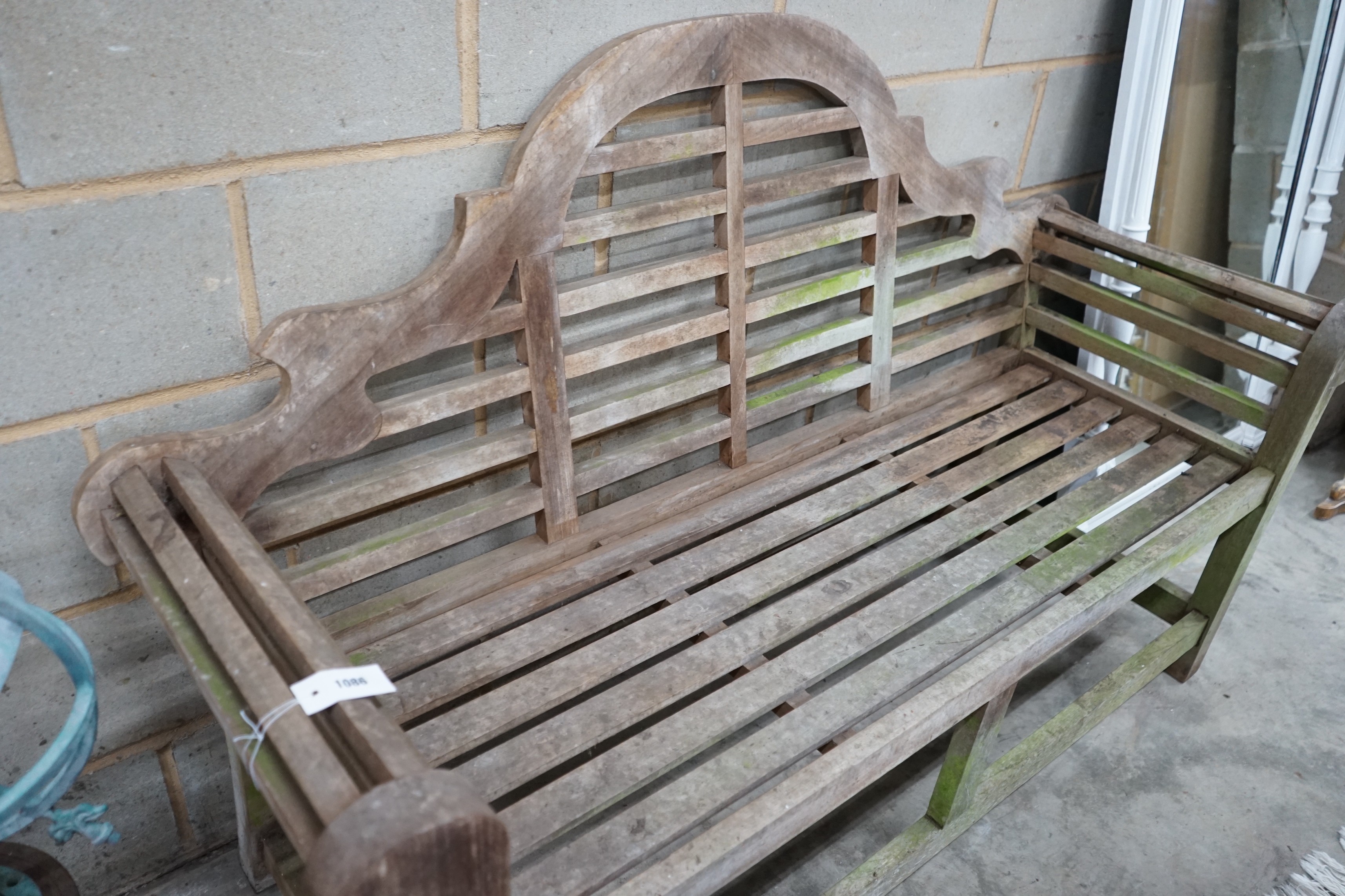 A Lutyens style weathered teak garden bench width 166cm, depth 62cm, height 106cm